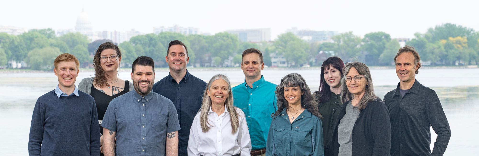 designCraft staff in front of lake with Madison skyline in background