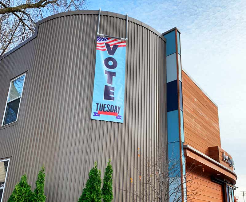 designCraft building with banner that reads VOTE Tuesday