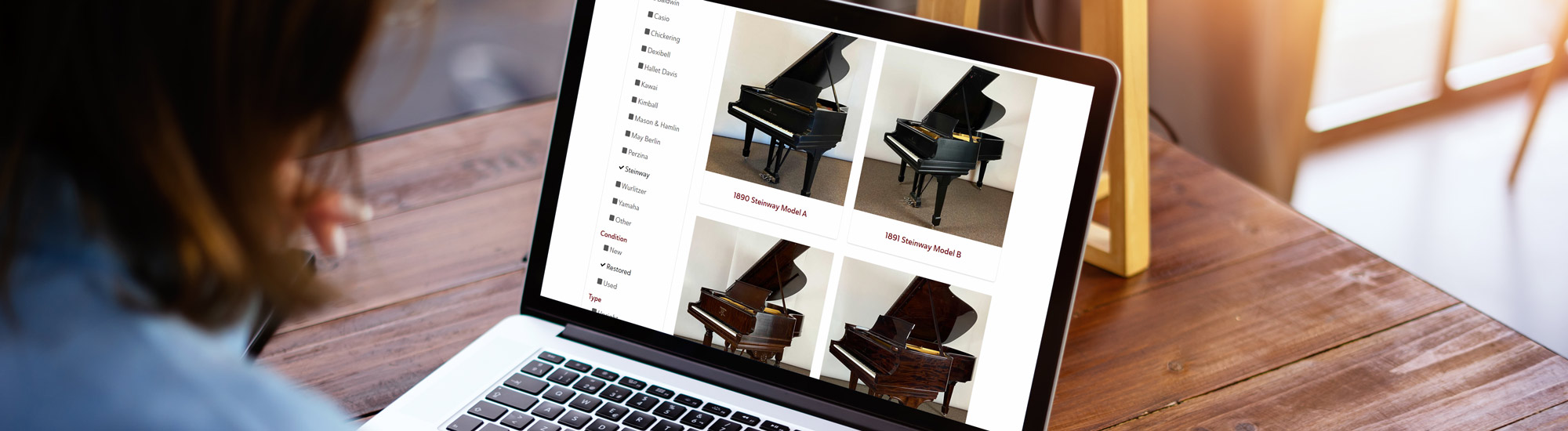 Farley's House of Pianos' piano gallery on a laptop