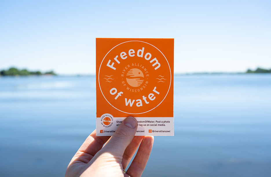 Freedom of Water sticker in front of lake